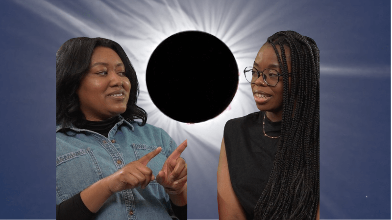 Titi and Zakiya in front of an image of an eclipse
