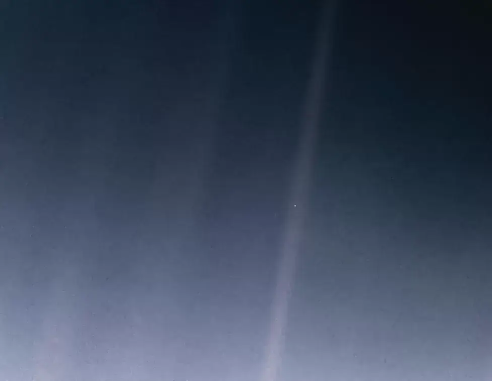 The Pale Blue Dot - a photo taken by Voyager 1 when it was about four billion miles away from Earth.