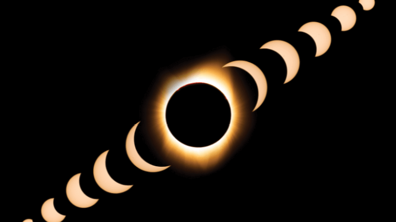 A solar eclipse is shown as all it's stages against a black background