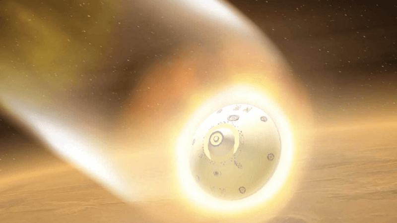 A spacecraft burns as it reenters an atmosphere