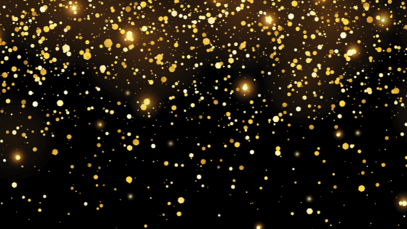 Gold glittery particles fall from the top edge of the image towards the bottom on a black background