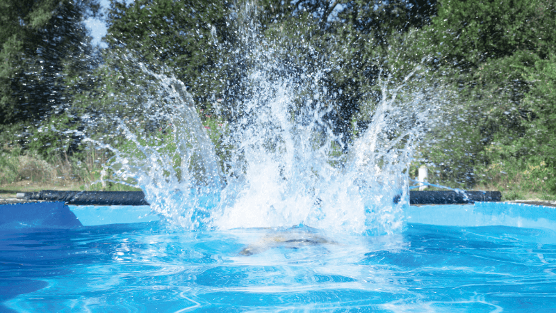 The splash in a pool after someone jumps in