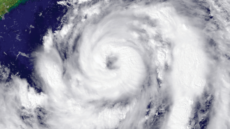 A hurricane approaches land as viewed from space