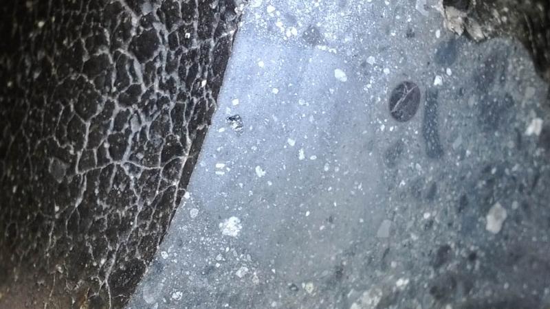 A close up cross section of a meteorite.