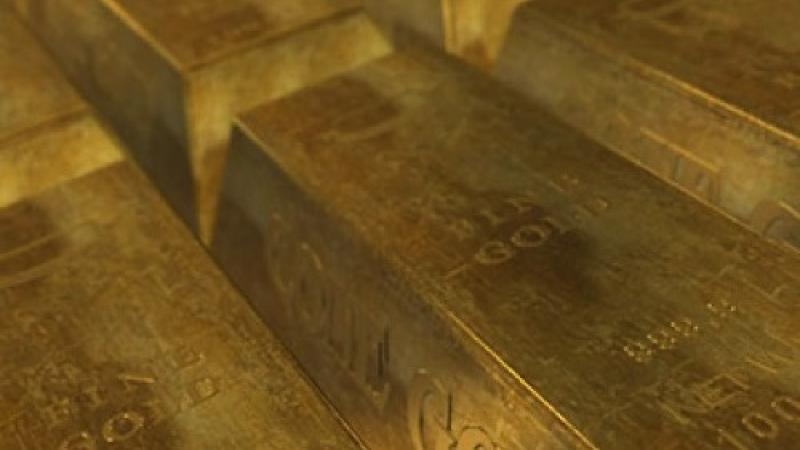 A close up of bars of gold.