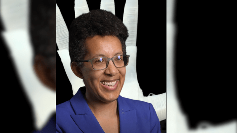 Professor Dorsey in front of a soft robot