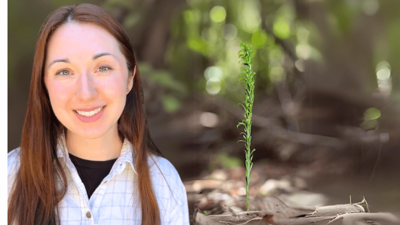Alex Dainis in front of an image of a fern