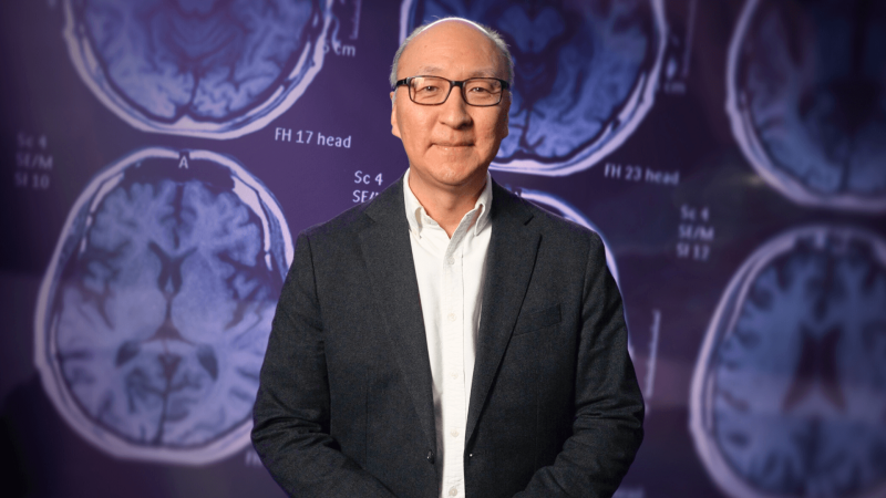 Insoo Hyun with images of human brain scans