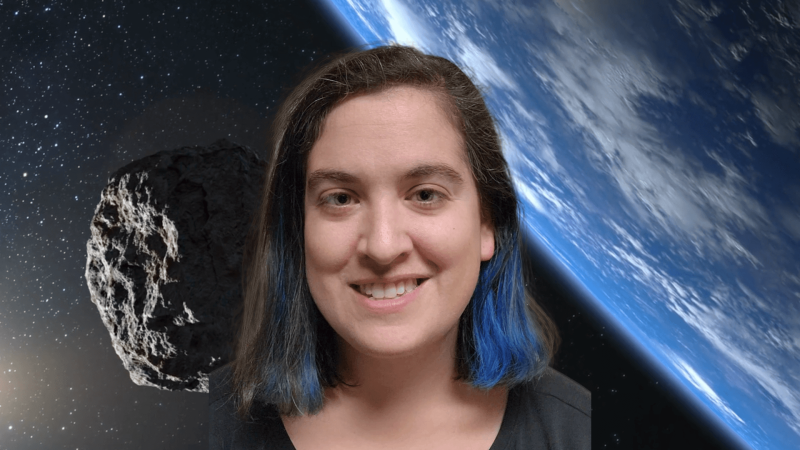 Talia with an image of an asteroid near Earth