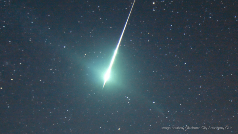 A teal Quadrantid meteor in the night sky