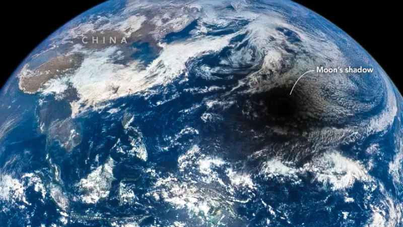 A total solar eclipse seen from space, showing the shadow of the Moon on the Earth. Credit: NASA/DSCOVER/EPIC Team