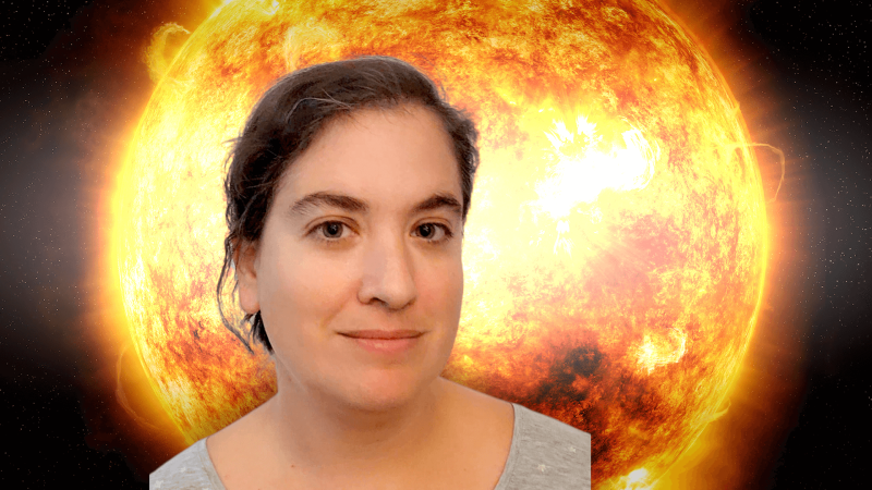 Talia in front of an image of the Sun