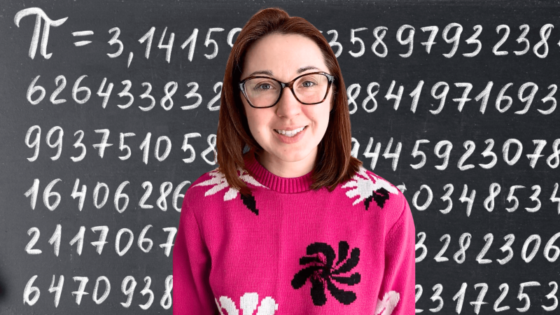 Alex Dainis in front of a chalkboard showing the numbers of pi.