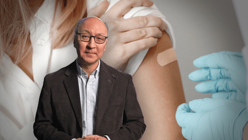Insoo Hyun in front of an arm with a bandaid after a shot