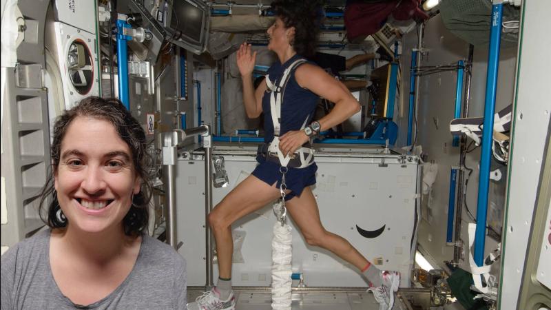 Talia in front of an image of Suni Williams running on a treadmill in space