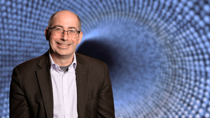 David Kaiser in front of a wormhole