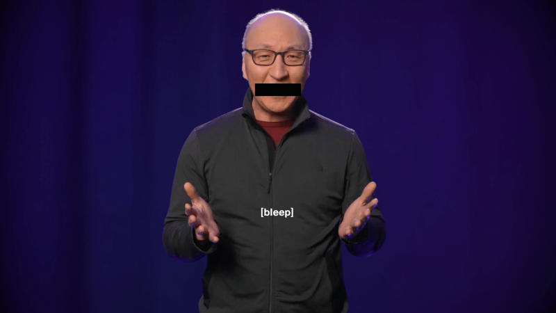 Insoo Hyun in front of a purple black drop with a black sensor bar over his mouth.