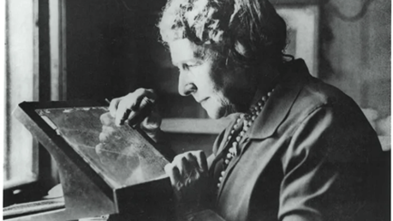 Annie Jump Cannon examines an image
