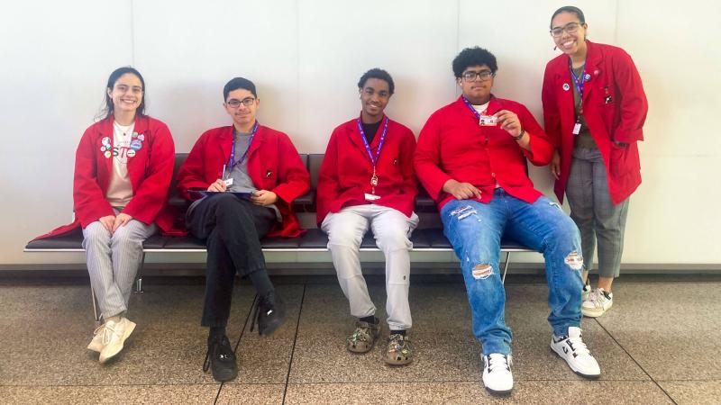A group of interns and a Museum staff member.