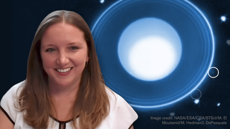 Stephanie Milam in front of a photo of Uranus and its new moon
