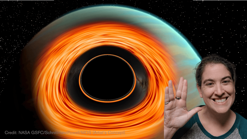 Talia smiling with her hands making the Spok hand symbol in front of a black hole inside of a planet