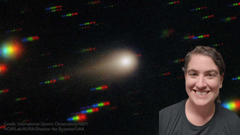 Talia smiling in front of a photo of Comet 3i Atlas