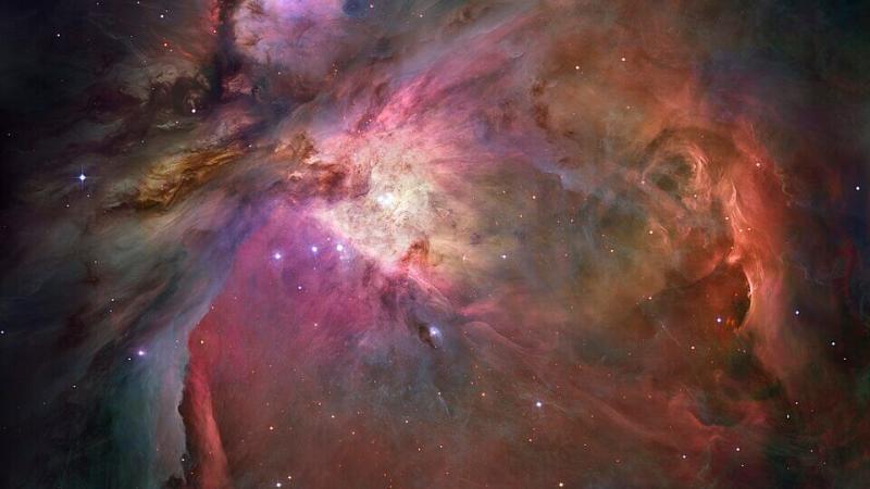This classic image of the Orion Nebula with all of its colors on full display was taken by the Hubble Space Telescope. Note the especially bright area near the Nebula’s center. Credit: NASA/ESA/M. Robberto