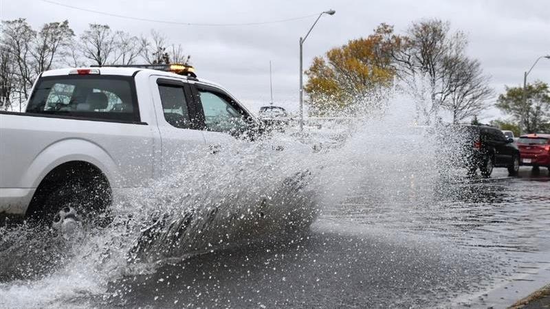 Car on a flooding road