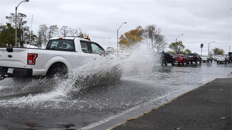 Car on a flooding road