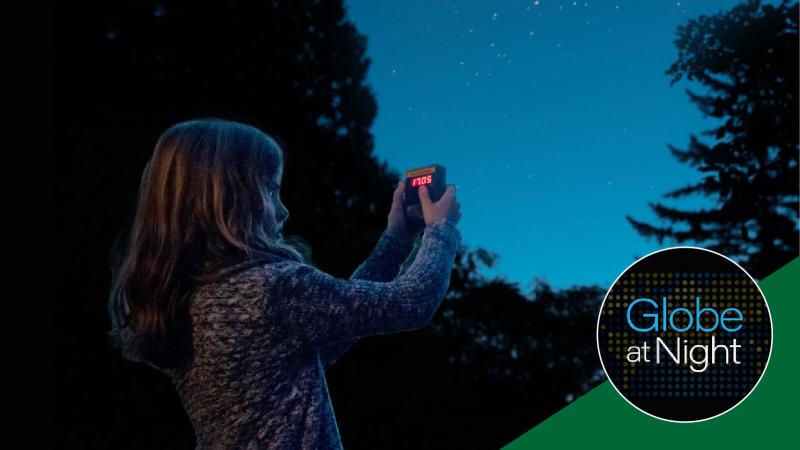 Globe At Night - a young girl measuring light pollution by counting stars.
