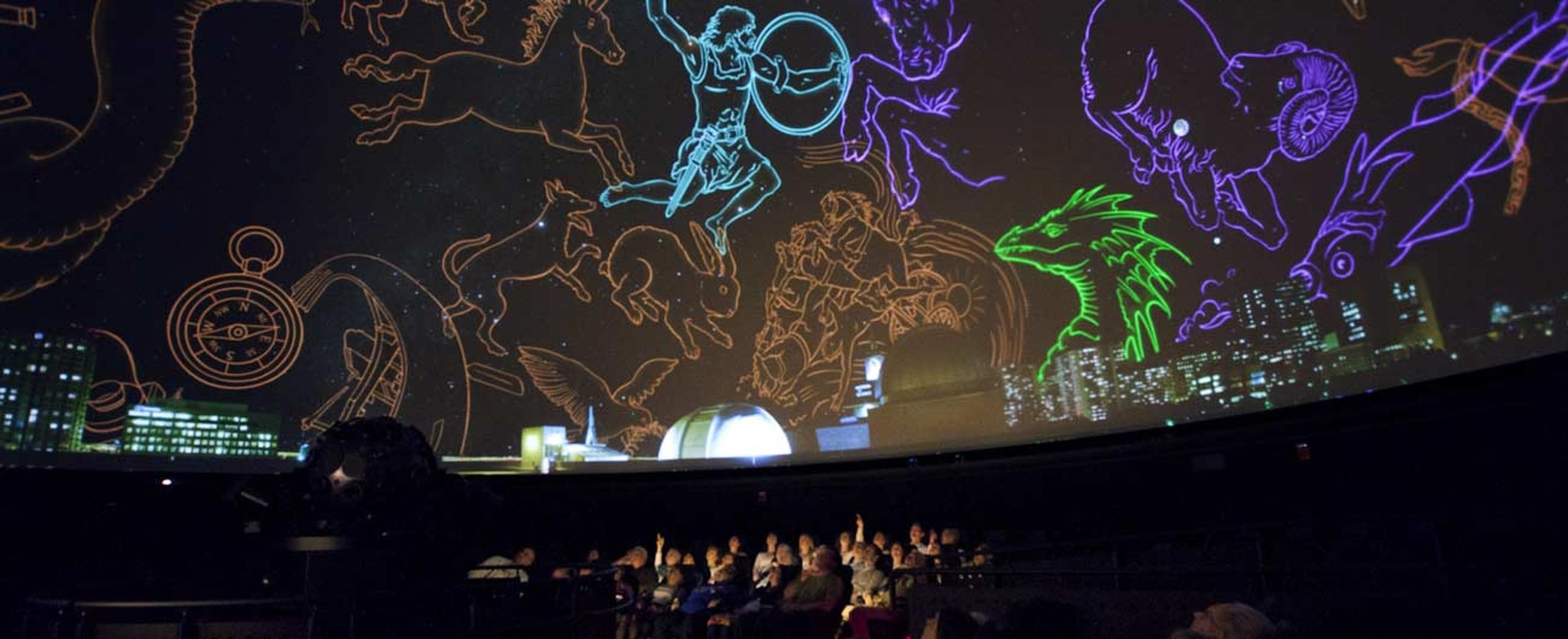 Guests enjoying the Planetarium show "Wonder of the Night Sky".