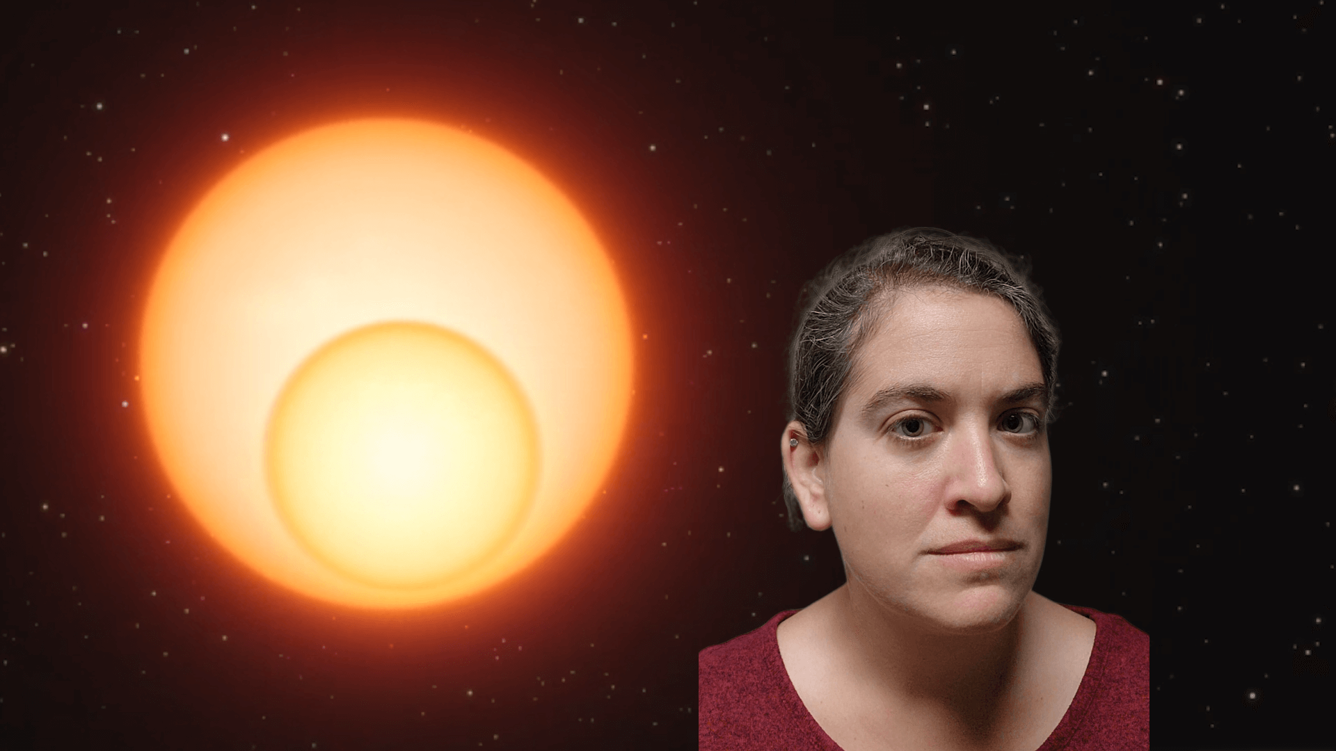 Talia in front of an image of two stars aligned