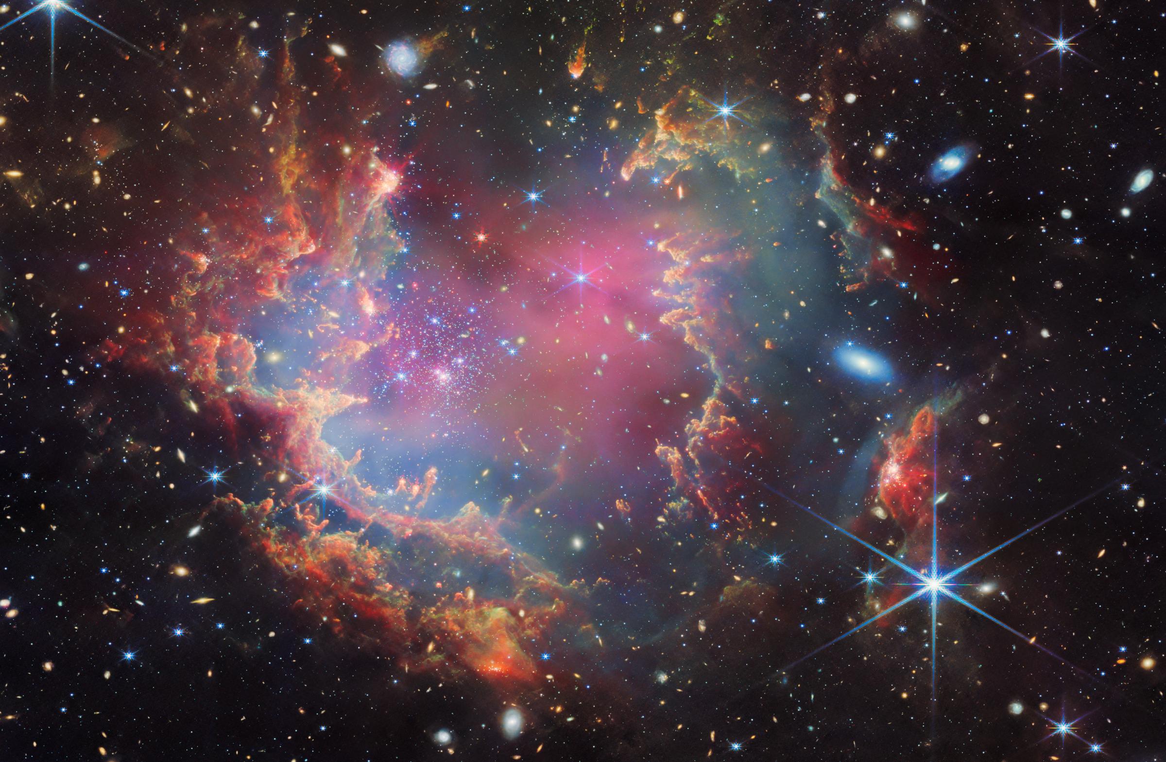 Star cluster NGC 602 as seen by the NIRCAM and MIRI instruments on the Webb Space Telescope.