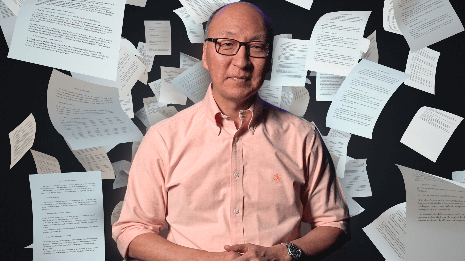 Insoo Hyun surrounded by papers