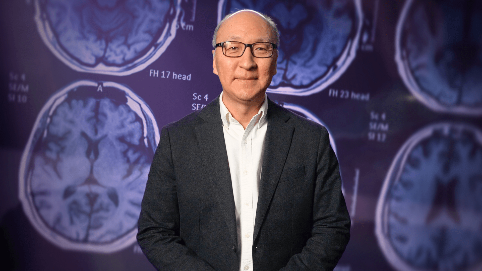 Insoo Hyun with images of human brain scans