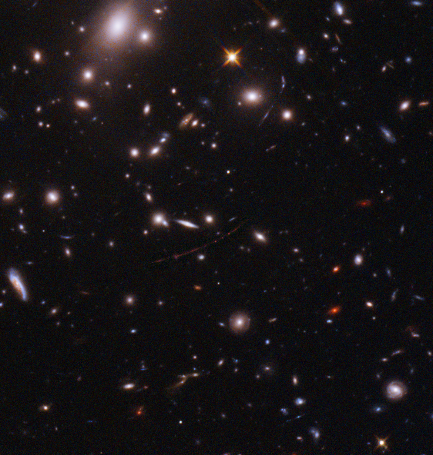 Hubble image of the gravitationally lensed galaxy nicknamed the Sunrise Arc. Credit: NASA/ESA/Brian Welch/Dan Coe/Alyssa Pagan