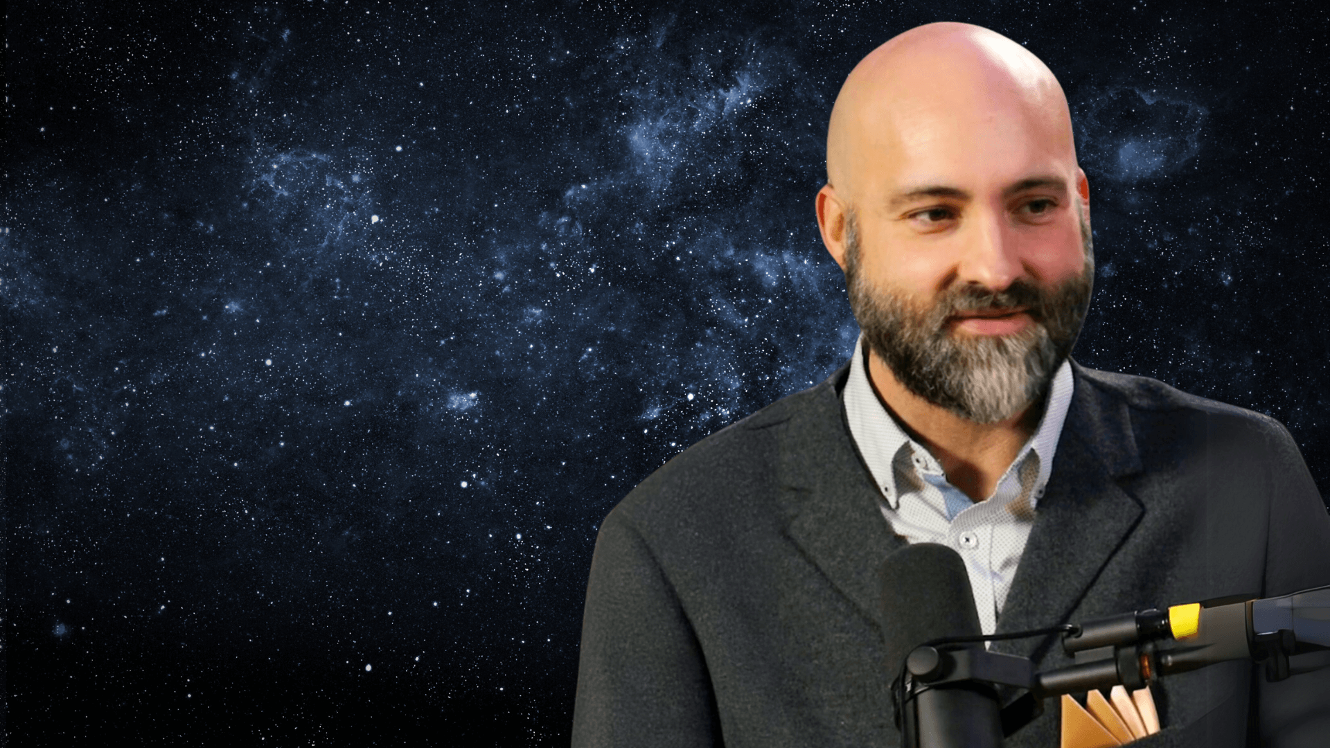 Dr. Paul Sutter against a cosmic background