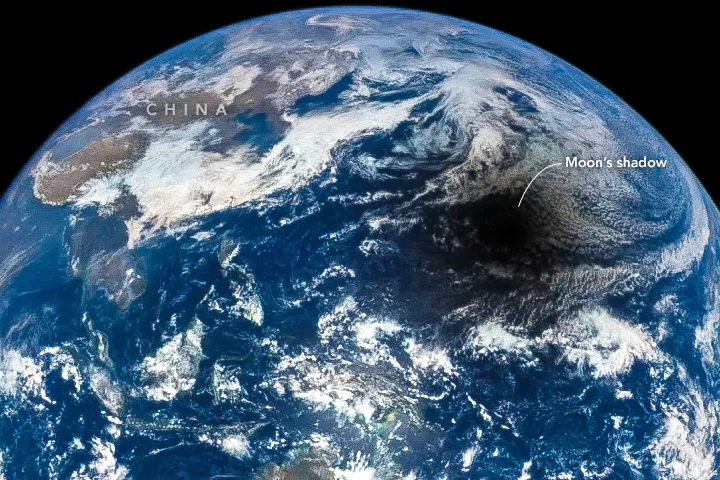 A total solar eclipse seen from space, showing the shadow of the Moon on the Earth. Credit: NASA/DSCOVER/EPIC Team