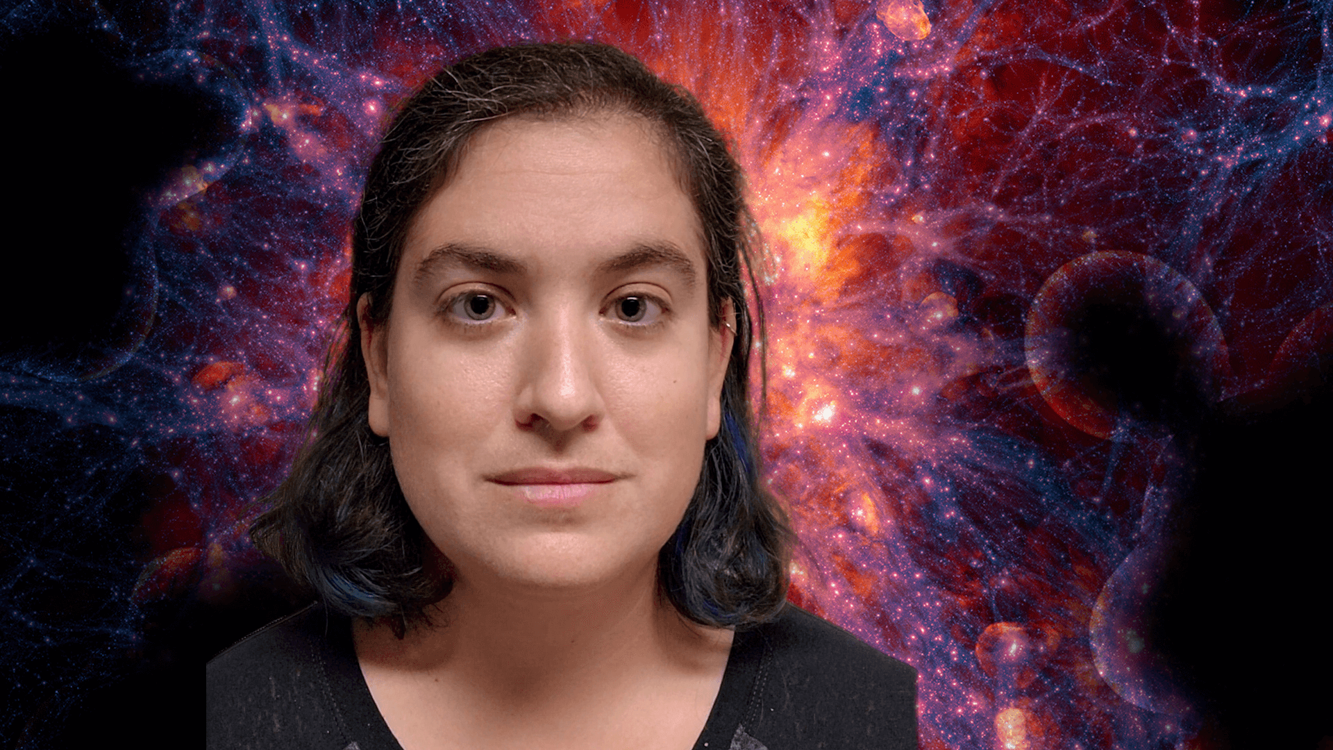 Talia in front of an illustrated representation of dark energy