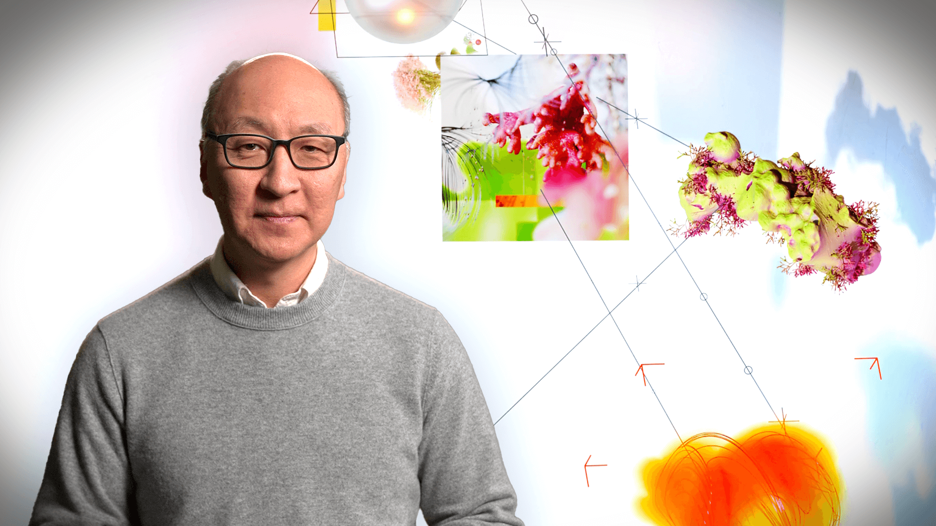 Insoo in front of a diagram of cells
