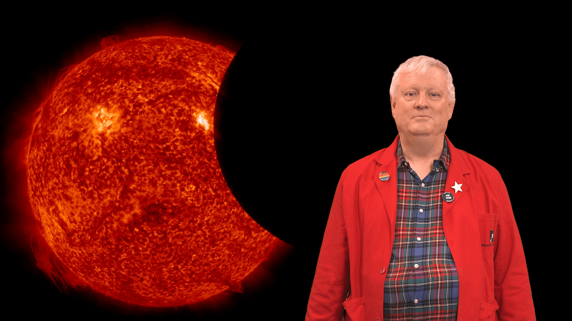 Chuck in front of a partial solar eclipse