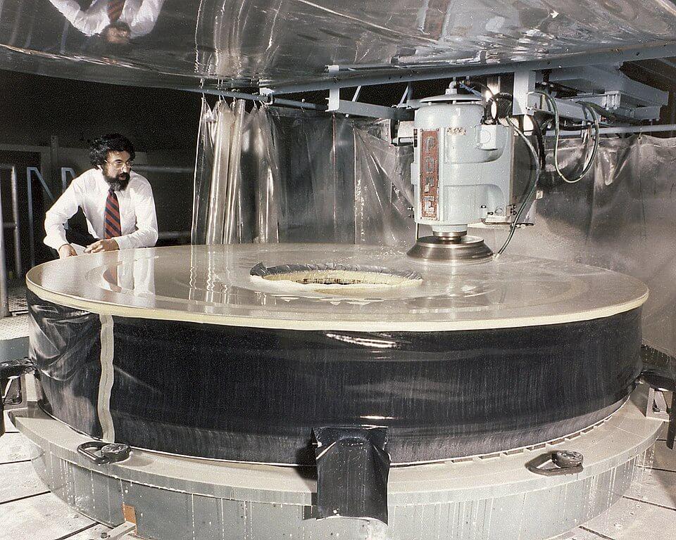 Hubble’s primary mirror being shaped (with, it turns out, a flaw). Credit: NASA Marshall Space Flight Center