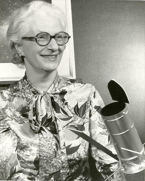 Nancy Grace Roman, the “Mother of Hubble”, with a model of the telescope. Credit: NASA