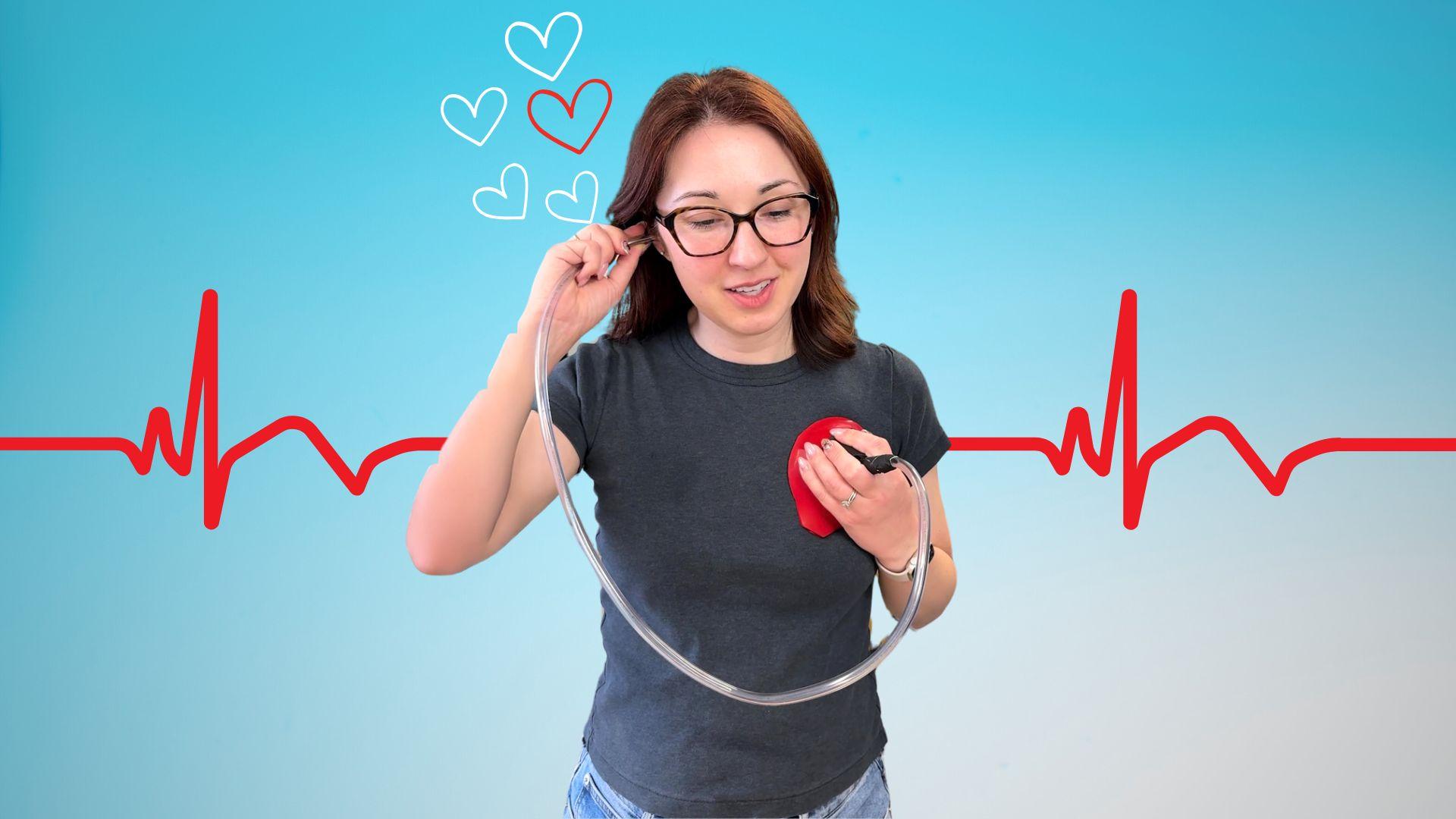Alex Dainis holds a homemade stethoscope to her ear in front of a blue background with a red heartbeat line