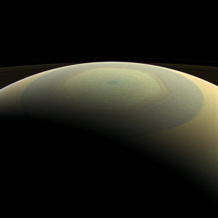This image showcases the hexagonal storm at Saturn’s north pole with its enormous eye. Credit: NASA/JPL/SSI