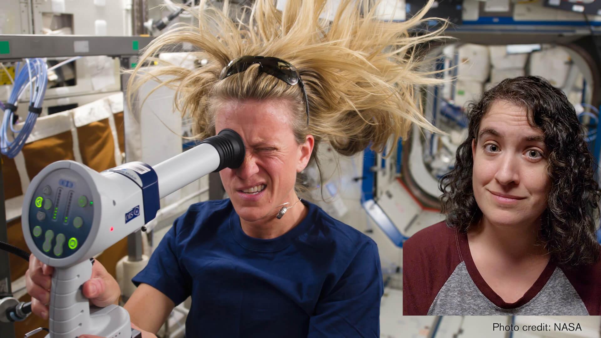 Talia in front of an astronaut testing her eyes.