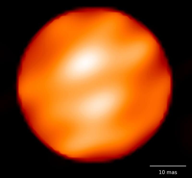 An image showing the surface of the star Betelgeuse with distinct features visible. It is one of the few stars we can resolve as more than a point of light. Credit: Observatoire de Paris/Xavier Haubois et al