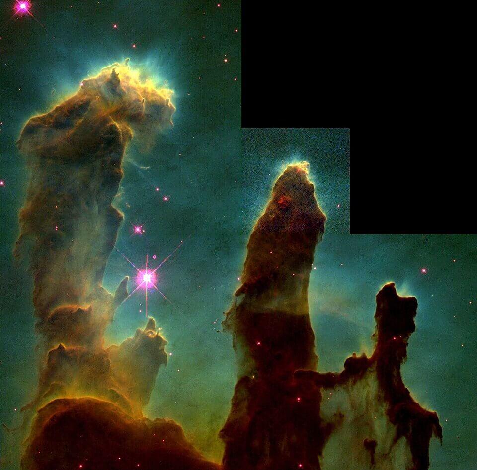 The so-called Pillars of Creation are a star-forming region made famous by this Hubble Telescope image. The Pillars are towering columns of the kind of cold gas that is forming new stars. Credit: NASA/University of Arizona