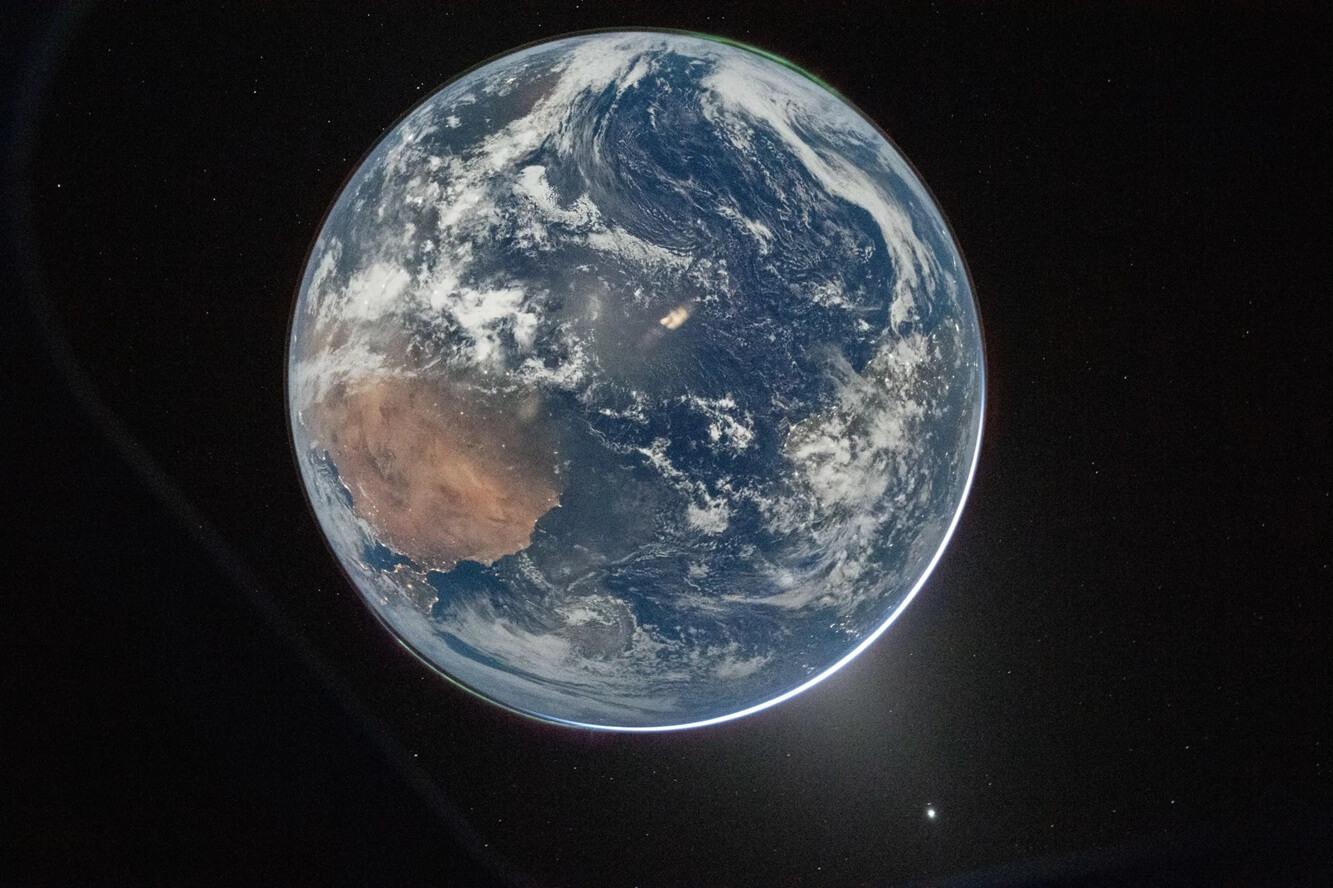 The image of a full Earth captured by Reid Wiseman as the crew began their journey to the Moon. This pic has been dubbed the “Hello, World” pic. Credit: NASA/Reid Wiseman