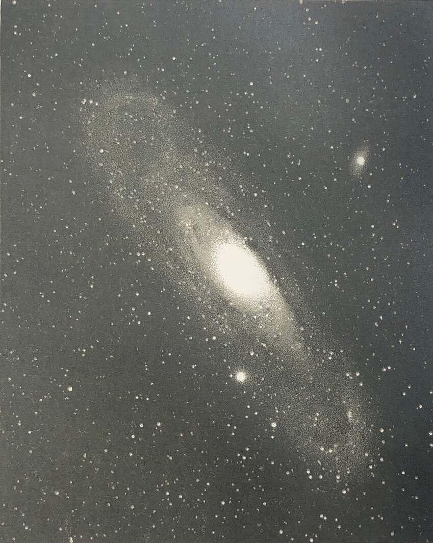 This is the earliest known photo of Andromeda, then known as the Andromeda Nebula, as seen in 1888 by pioneering astrophotographer Isaac Roberts. Credit: Isaac Roberts